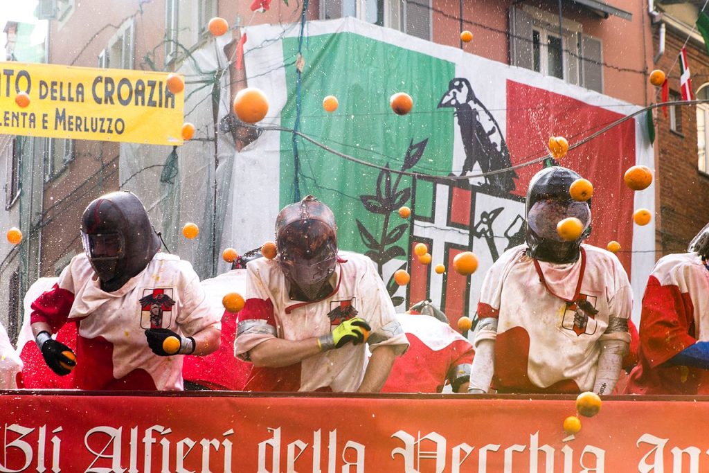 The Carnival of Ivrea in northern Italy features a large food fight in which oranges are tossed at pretend soldiers.