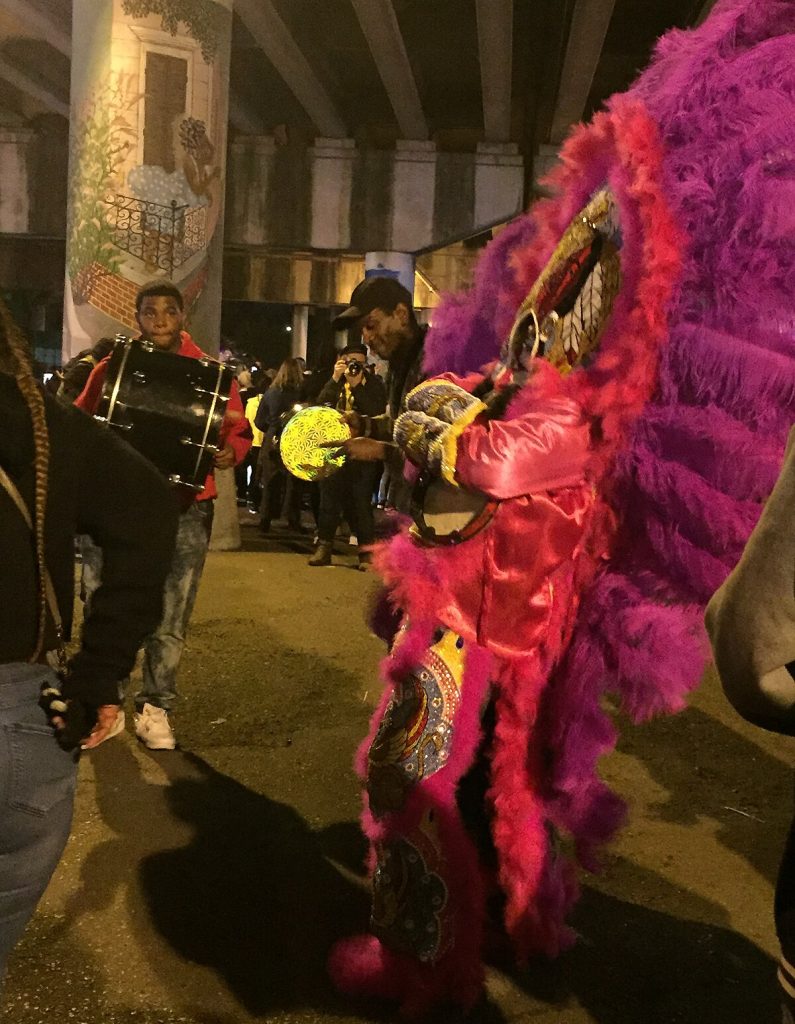 A Mardi Gras Indian with music on Saint Joseph’s Night in New Orleans in 2019.